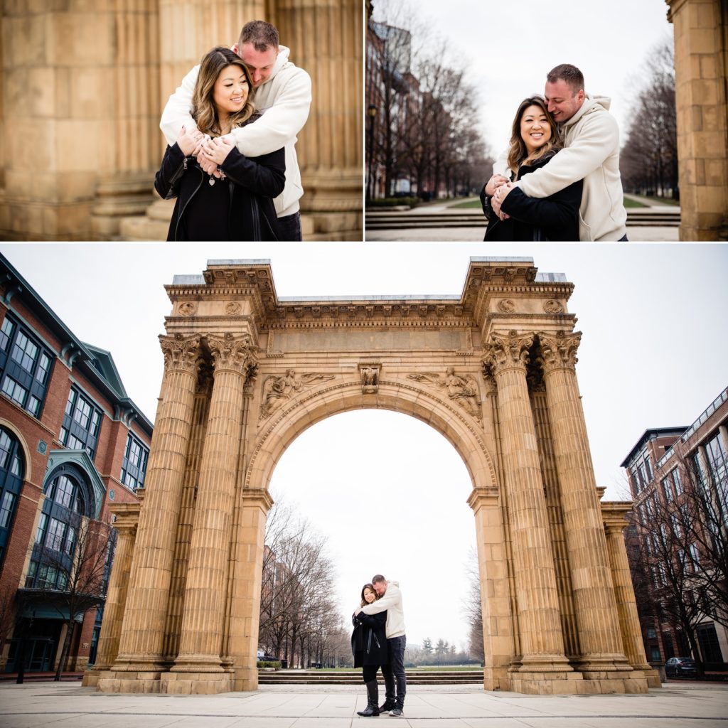 a couple posing in front of the entrance to McFerson Park