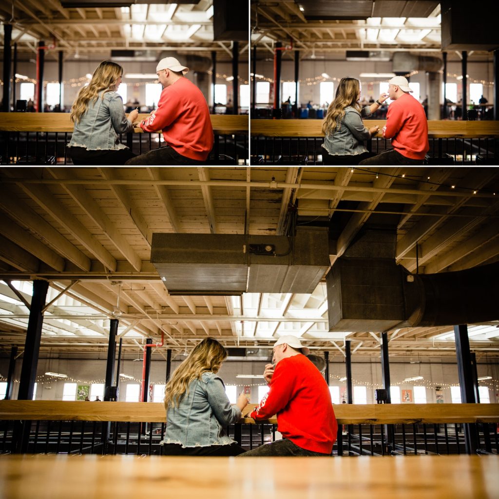 a couple eating ice cream during their engagement photos at North Market