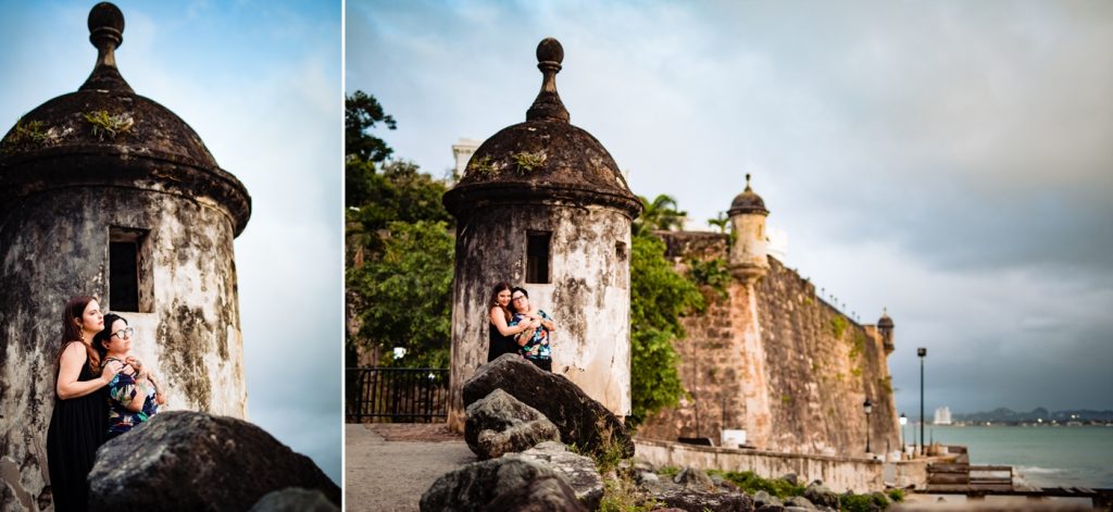 a couple stands in front of the fort during their San Juan photos