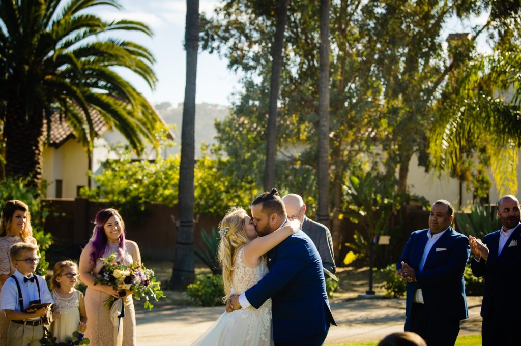 bride and groom's first kiss in Big Sur