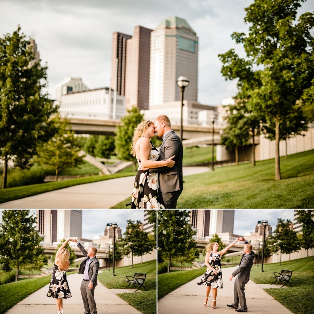 a couple dances during their engagement photos at Scioto Mile