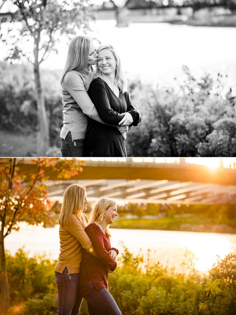 an LGBTQ couple cuddles in front of the Scioto River in Columbus