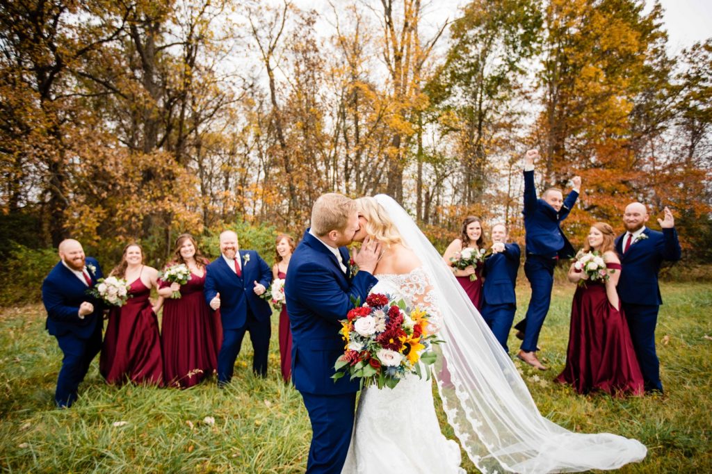 a couple celebrate with their wedding party after their Brookshire wedding