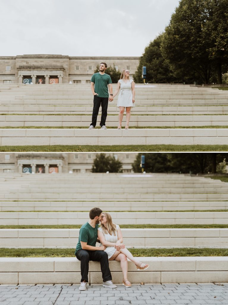 a couple poses on the grand staircase during their engagement photos at Genoa Park