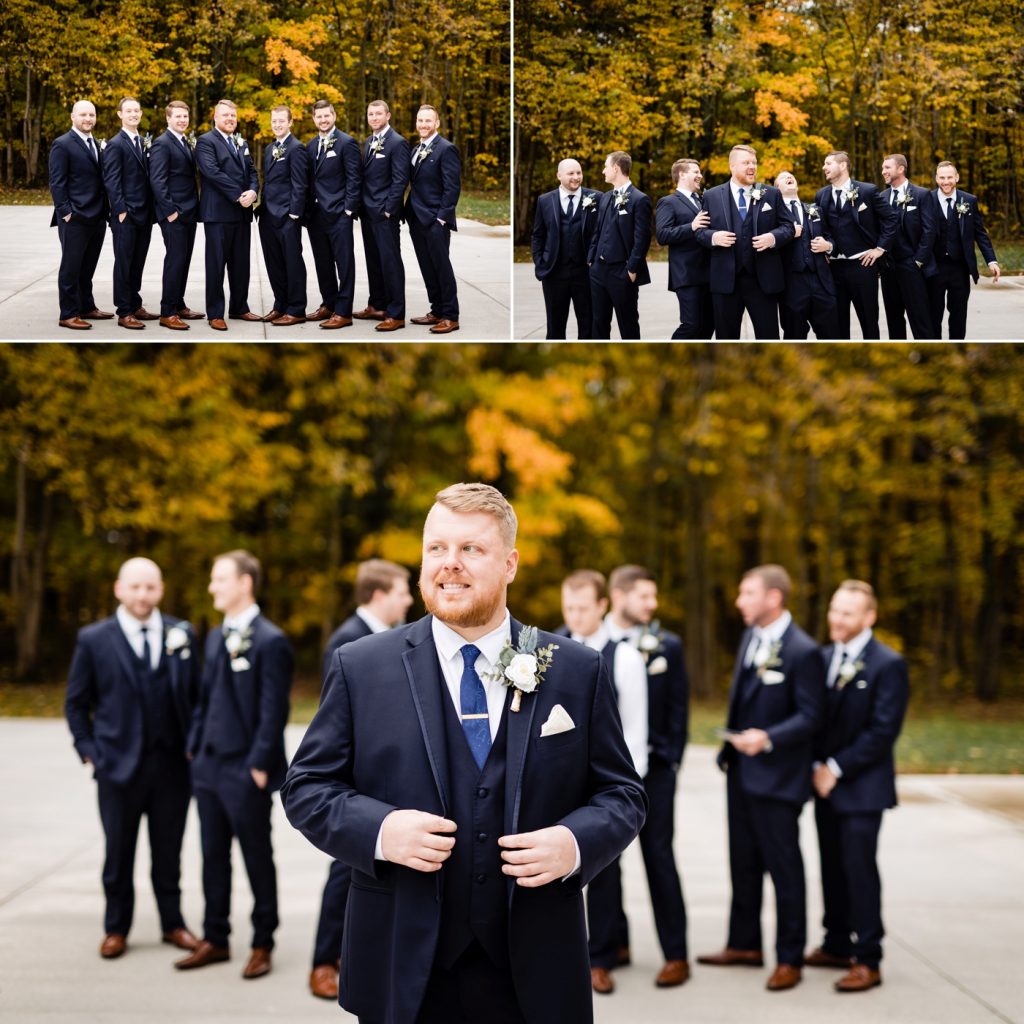 a groom laughs with his groomsmen before his wedding at Four Seasons Barn