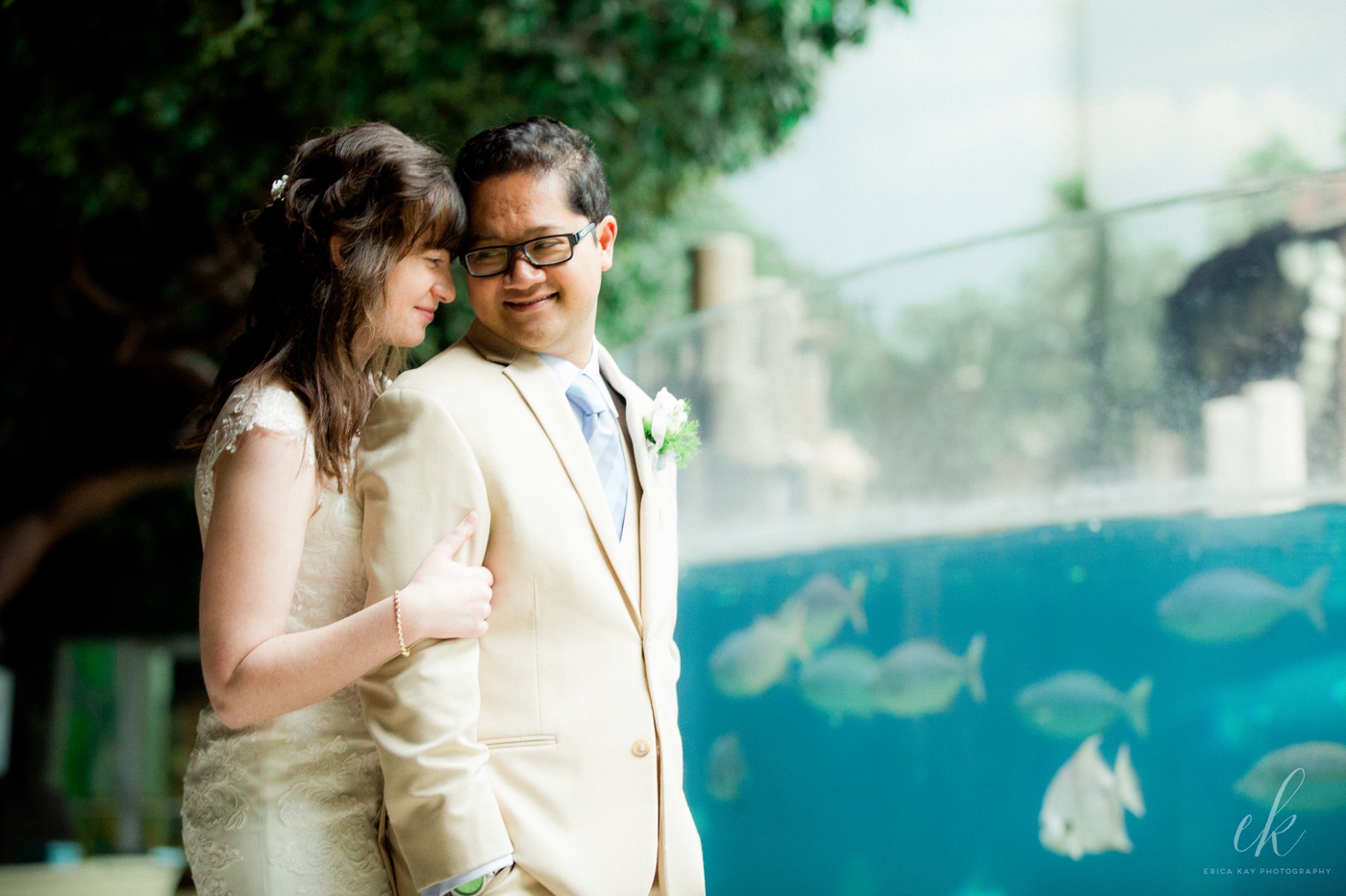 Columbus Zoo Wedding - A photo of the bride and groom with a school of fish.