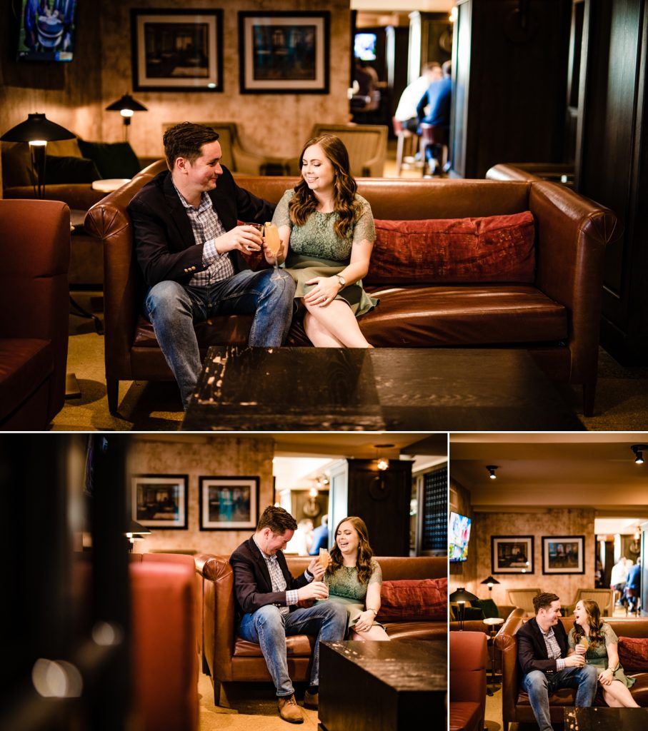 a couple enjoying cocktails during their engagement photos at The Keep