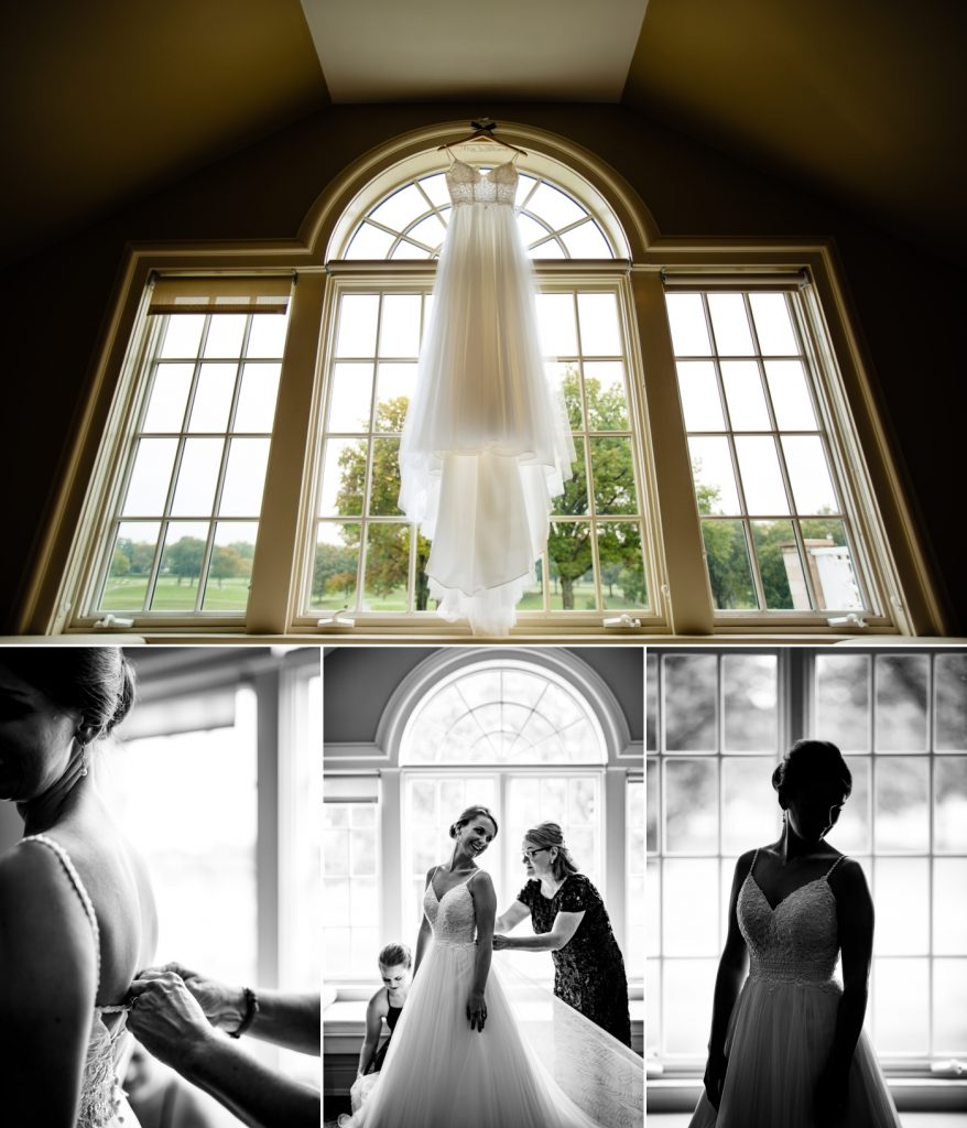 wedding dress hanging in the window at Scioto Country Club