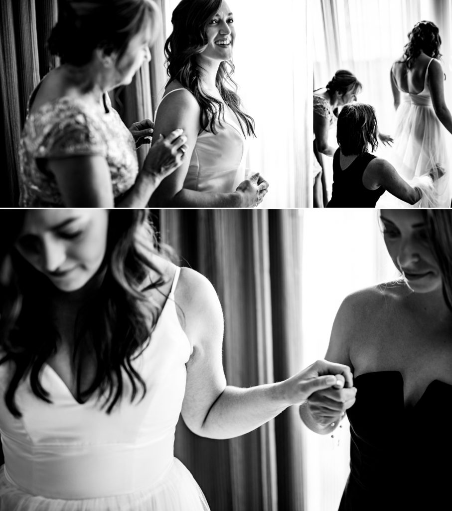 bride gets dressed with the help of her mom and friends before her wedding at The Exchange at Bridge Park