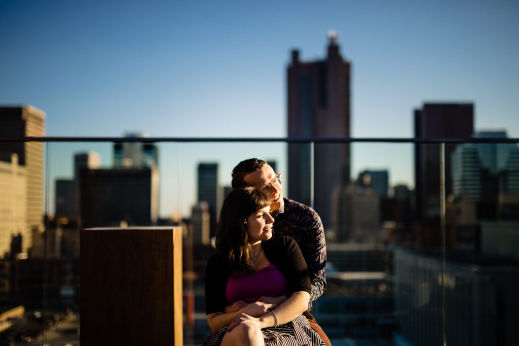 a gorgeous couple in front of the Columbus skyline during their Goodale Station engagement photos
