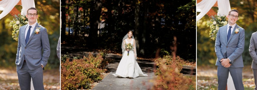 a bride walks down the aisle during her wedding at The Brook