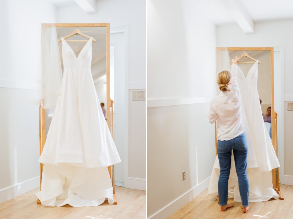 a bride holds her wedding dress before getting ready for her wedding at The Brook