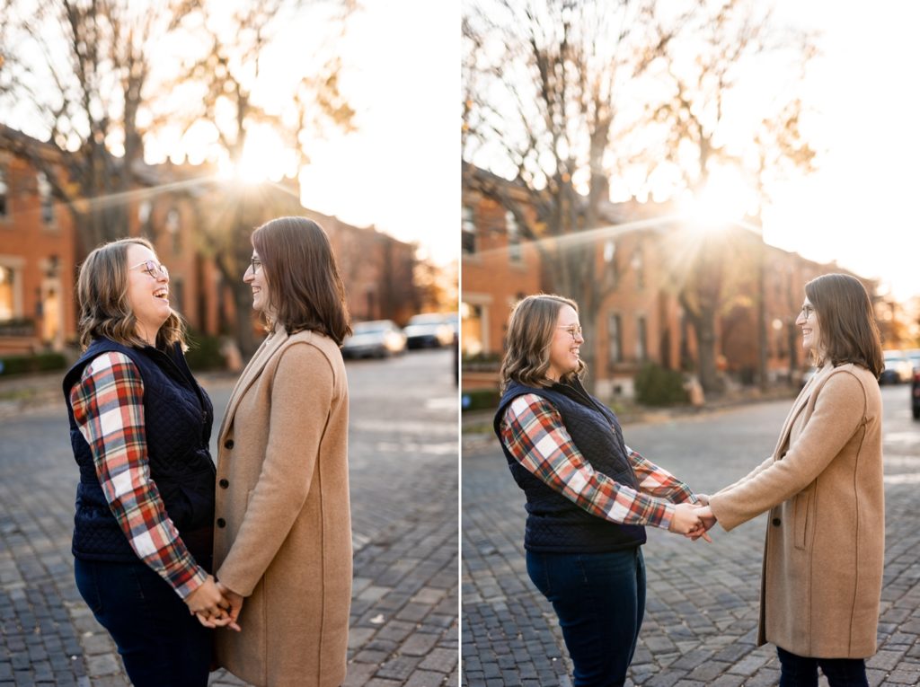 a couple dances in the street during their German Village engagement session