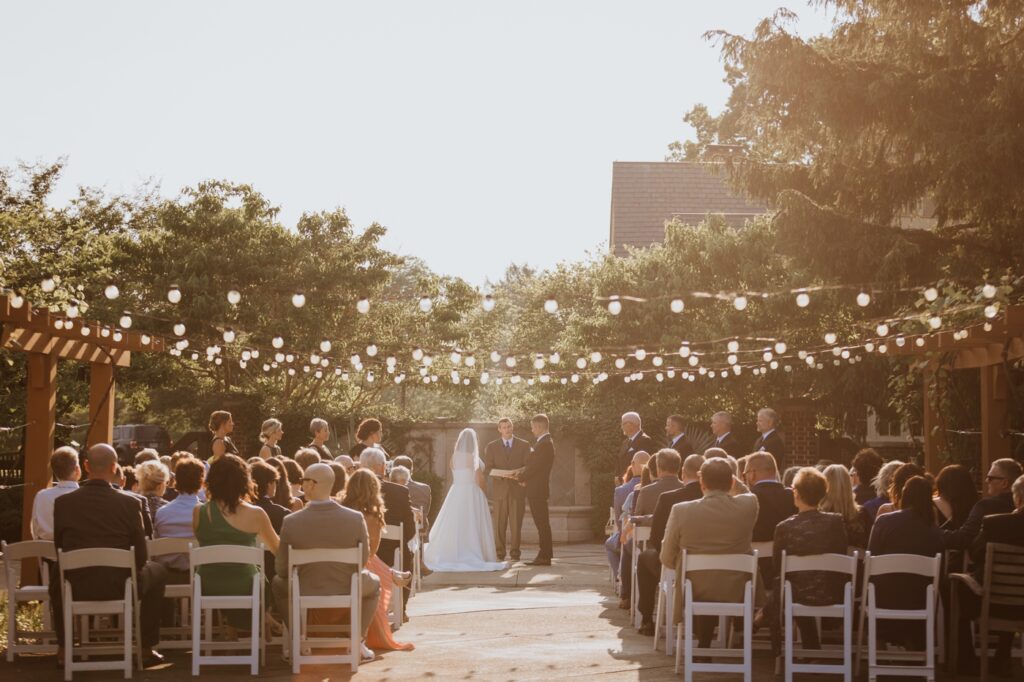 a ceremony at a wedding at Franklin Park Conservatory